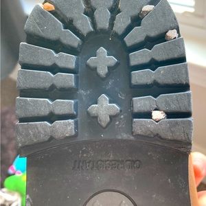 Pair of round toe brown Wolverine boots